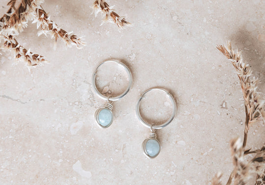 Aquamarine infinity hoop earrings
