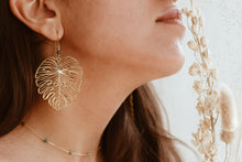 Load image into Gallery viewer, Monstera leaf charm earrings with dainty gemstone