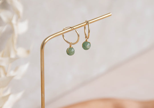 Orbit gold hoop earrings with green Jade charm