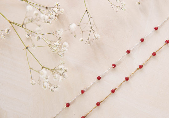 Daisy bracelet with tiny red jade beads