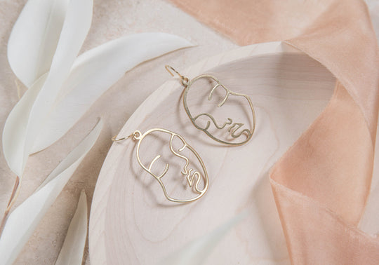 Gaia face earrings