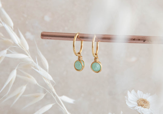 Infinity gold filled hoop earrings with wirewrapped green Jade charm