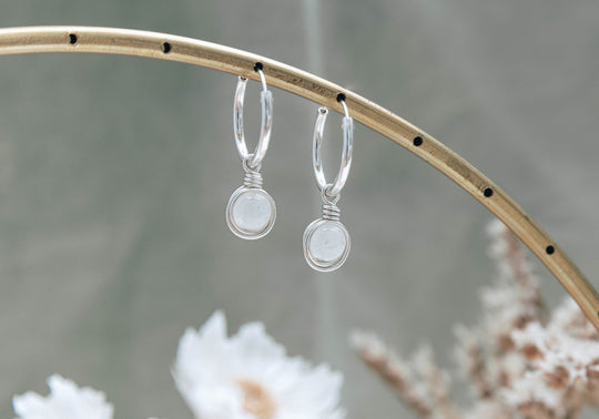 Infinity silver hoop earrings with natural rainbow moonstone charm