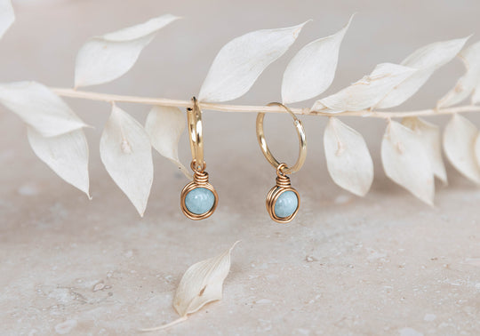 Aquamarine infinity hoop earrings