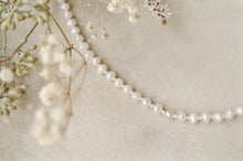 Load image into Gallery viewer, Deco necklace ~ timeless freshwater pearl knotted necklace with sterling silver clasp
