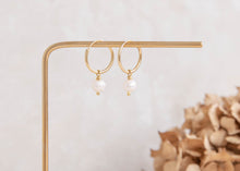 Load image into Gallery viewer, Orbit gold hoops with single natural round freshwater pearl charm earrings
