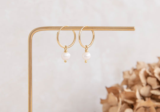 Orbit gold hoops with single natural round freshwater pearl charm earrings