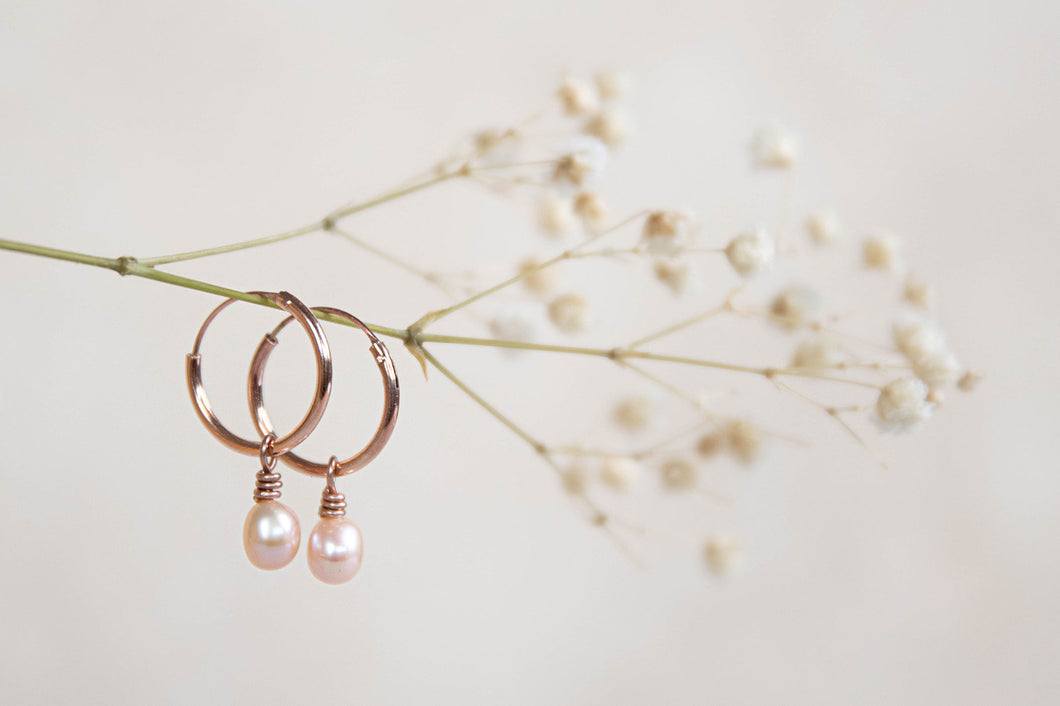 Orbit rose gold hoops with pink peach pearl charm earrings