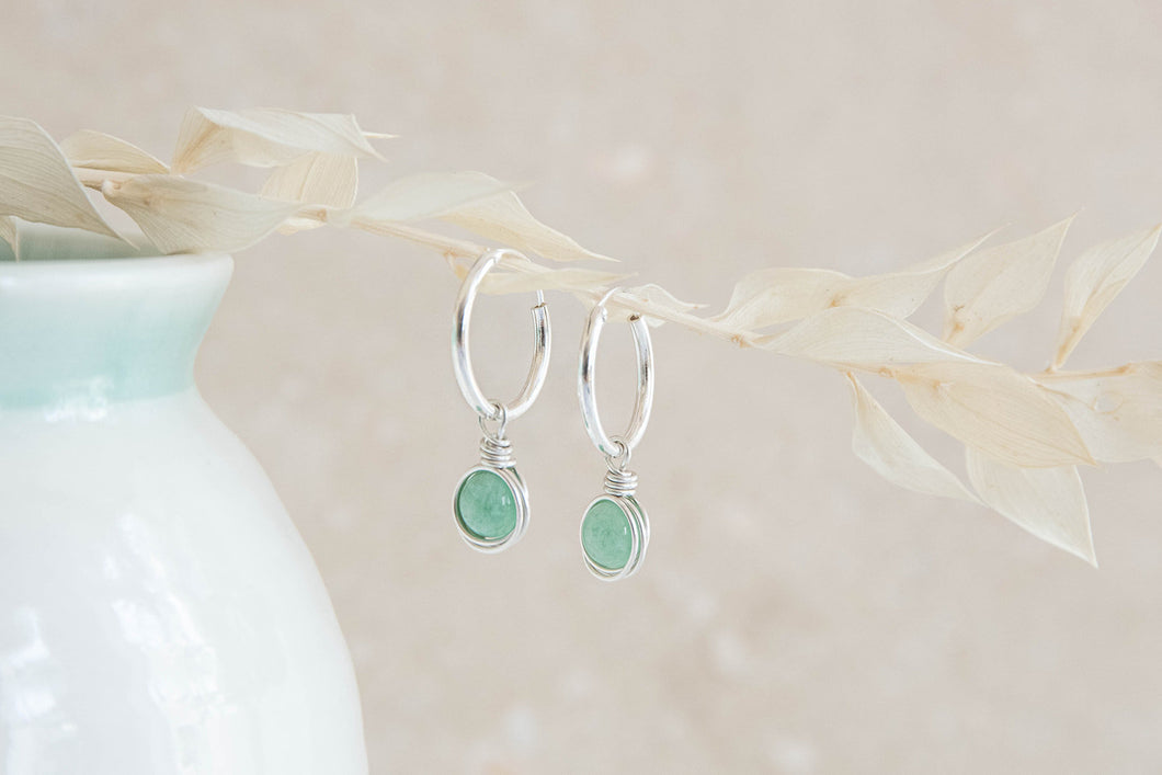 Infinity sterling silver hoop earrings with wire wrapped green Jade charm