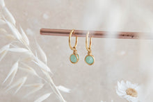 Load image into Gallery viewer, Infinity gold filled hoop earrings with wirewrapped green Jade charm
