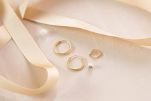 Load image into Gallery viewer, Orbit gold hoop earrings with pale aqua jade charm
